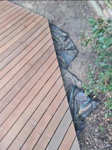 Trimming hardwood deck with circular saw